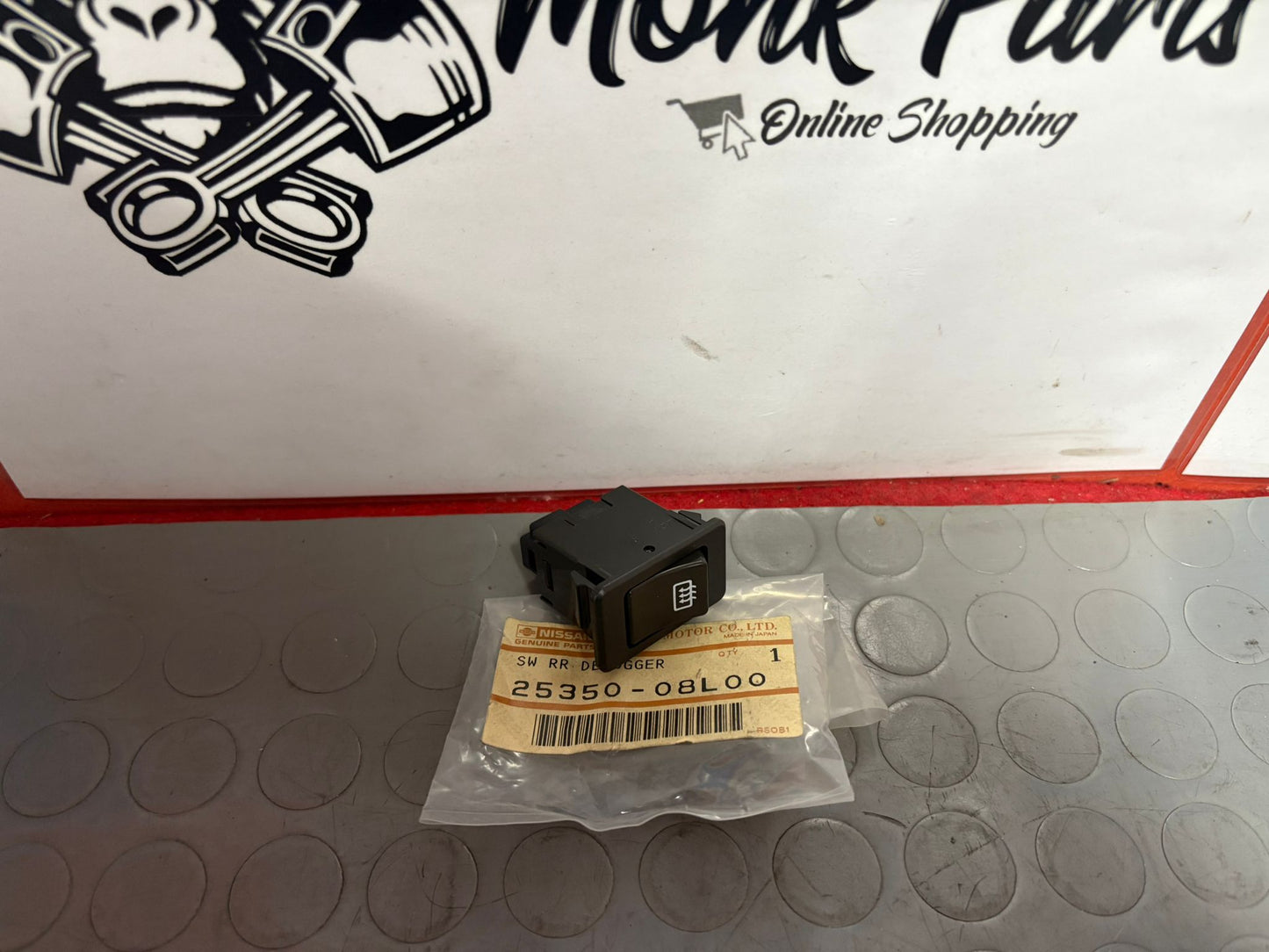 Boton desempañar cristal trasero NISSAN VANETTE 25350-08L00 Original , NUEVO