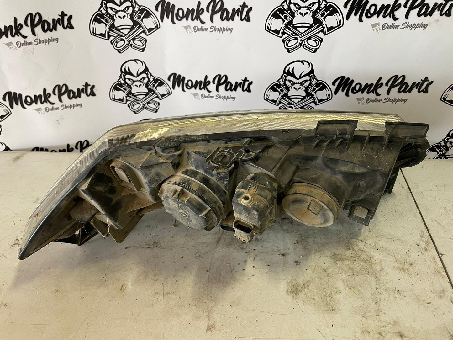 Faro delantero izquierdo RENAULT MEGANE II 7701064018