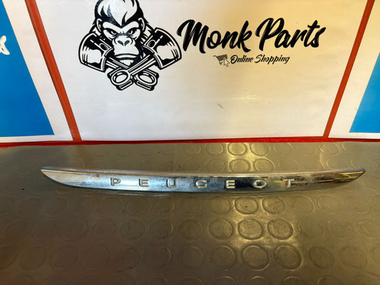 Moldura cromada porton PEUGEOT 208 96738457VD