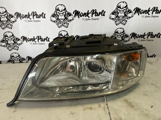 Faro delantero izquierdo AUDI A6 C5 148473-00