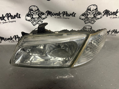 Faro delantero izquierdo NISSAN ALMERA N16