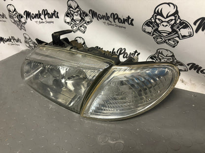 Faro delantero izquierdo NISSAN ALMERA N16